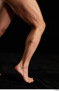 Herbert 1 10years calf flexing nude side view 0008.jpg